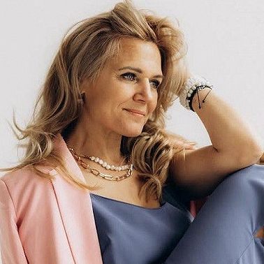 Лаура Лане - банковский работник, психолог и коуч